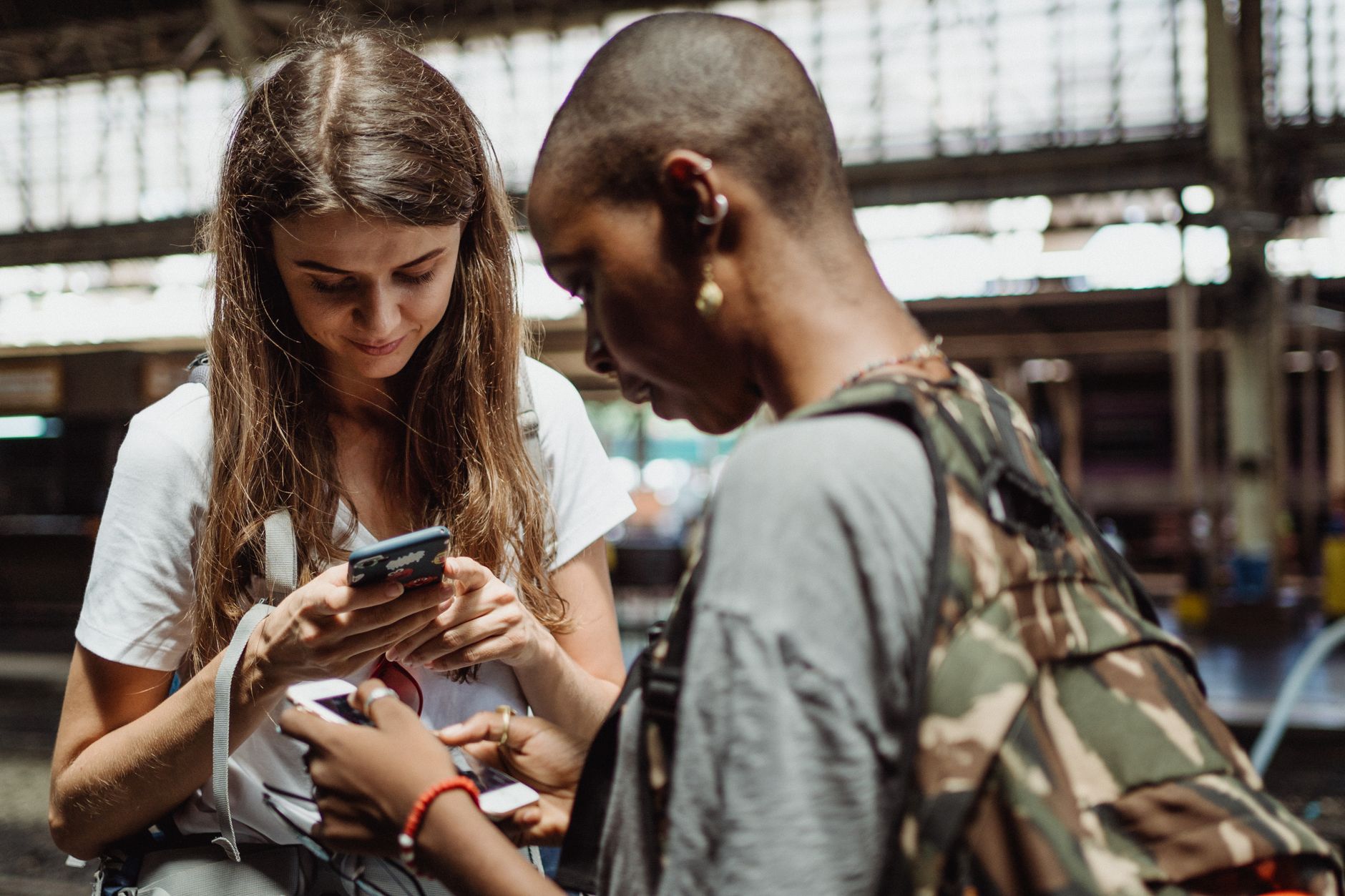tourists checking their smart phones