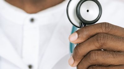 a person holding a stethoscope