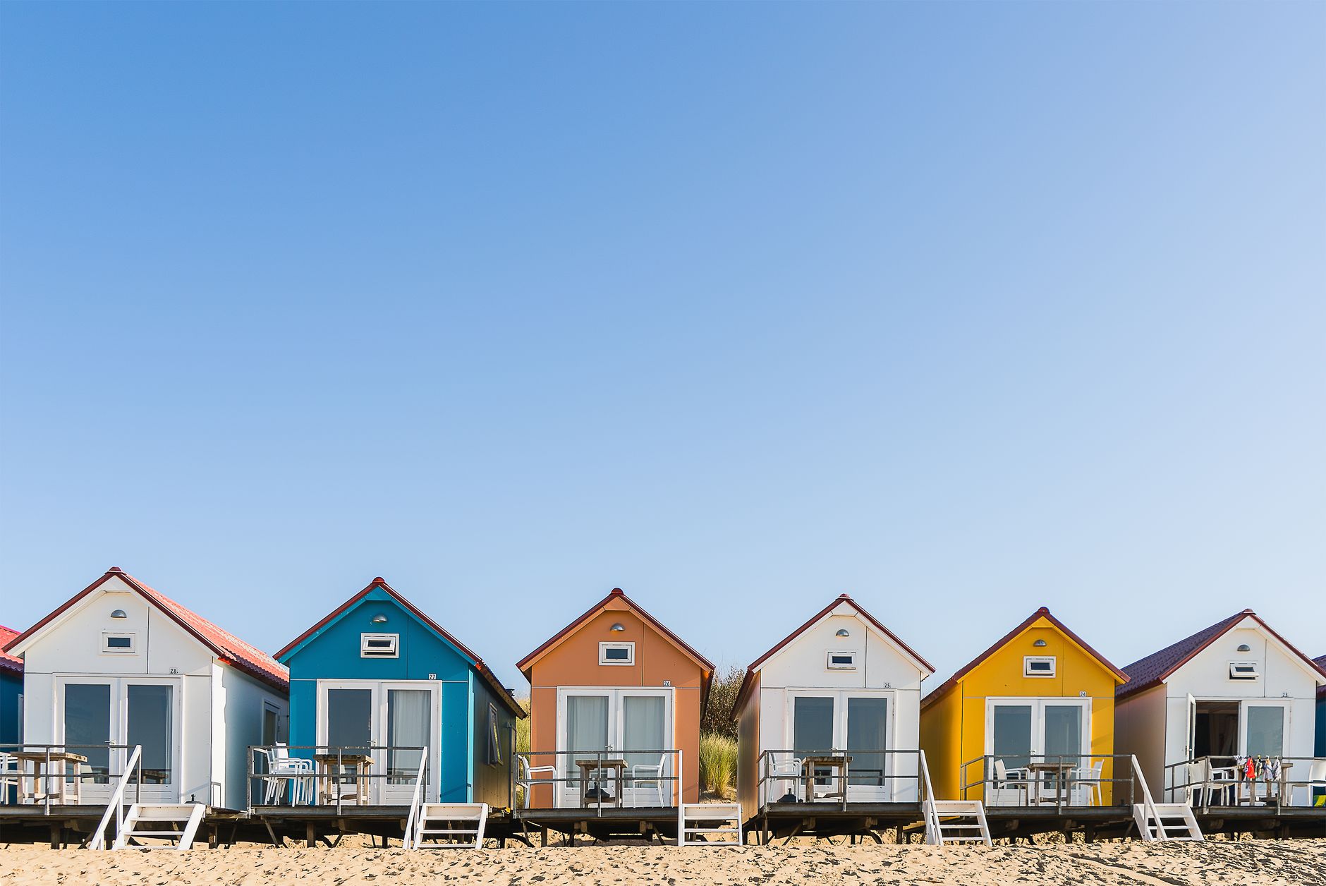 colorful little beach huts
