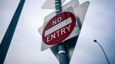 white and red no entry road sign