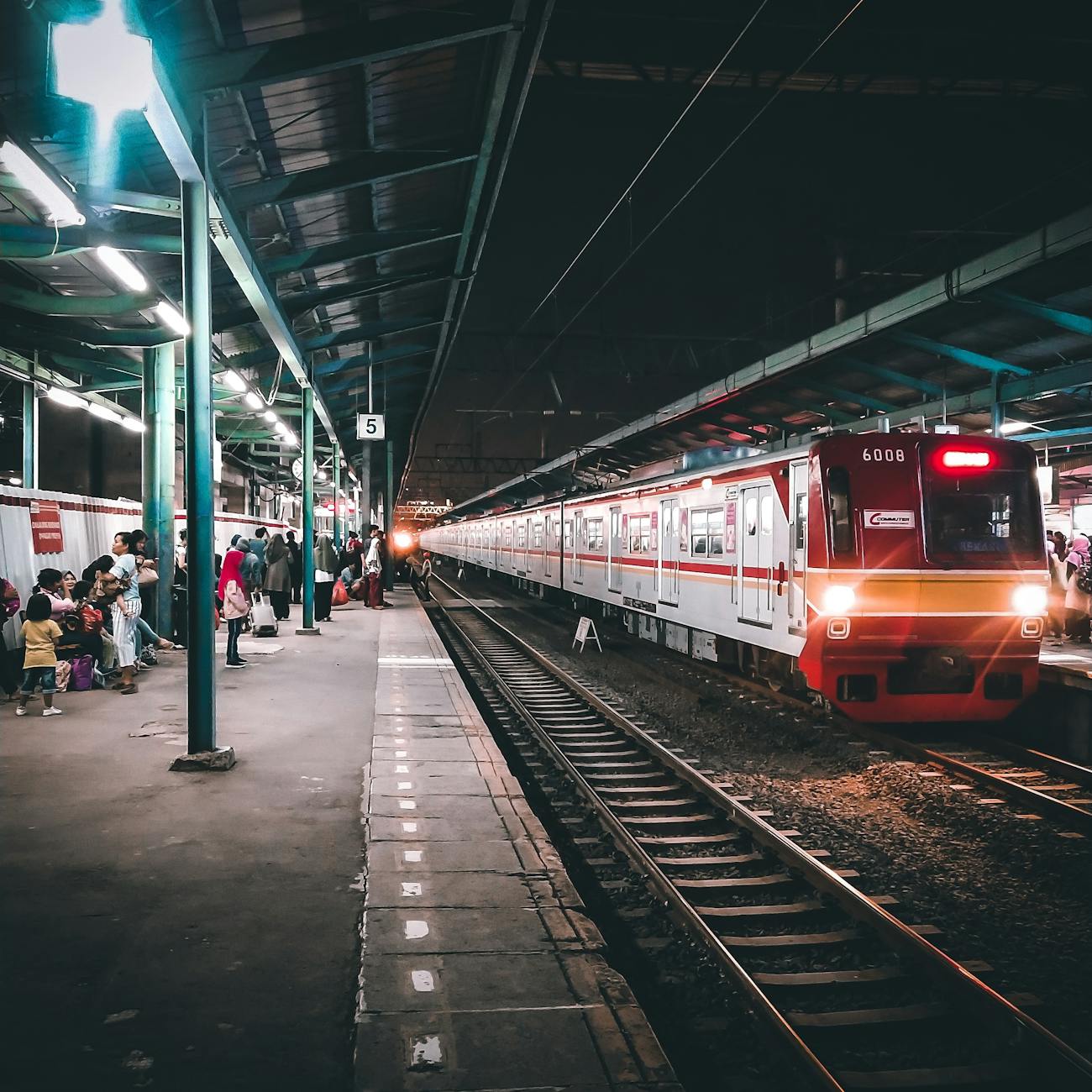 people waiting for train on the platform