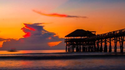 photography of a dock during sunset