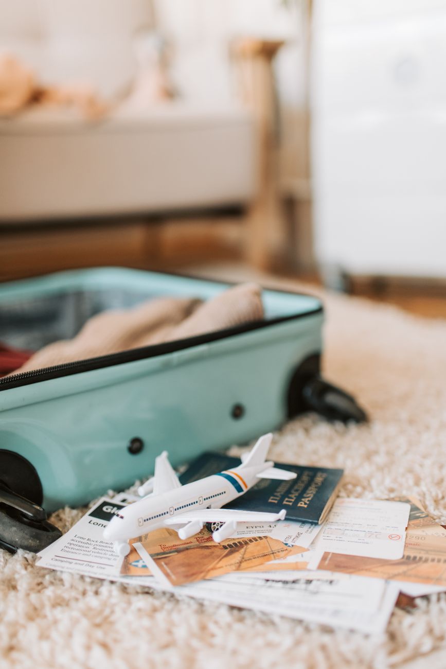 blue suitcase on the floor