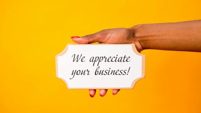 a person holding a signage