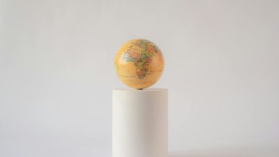 yellow globe on a tube stand