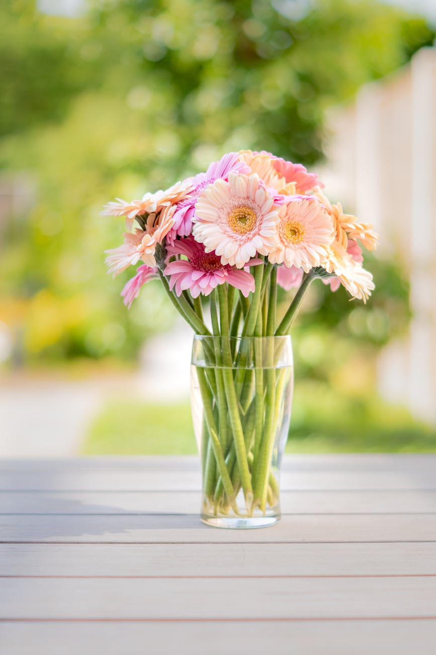 flowers in clear glass vase