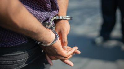 a person with handcuffs