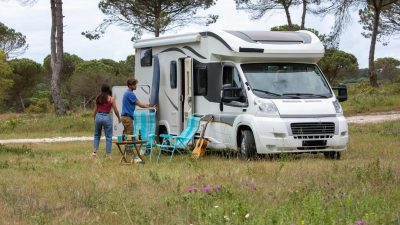 couple on vacation with rv