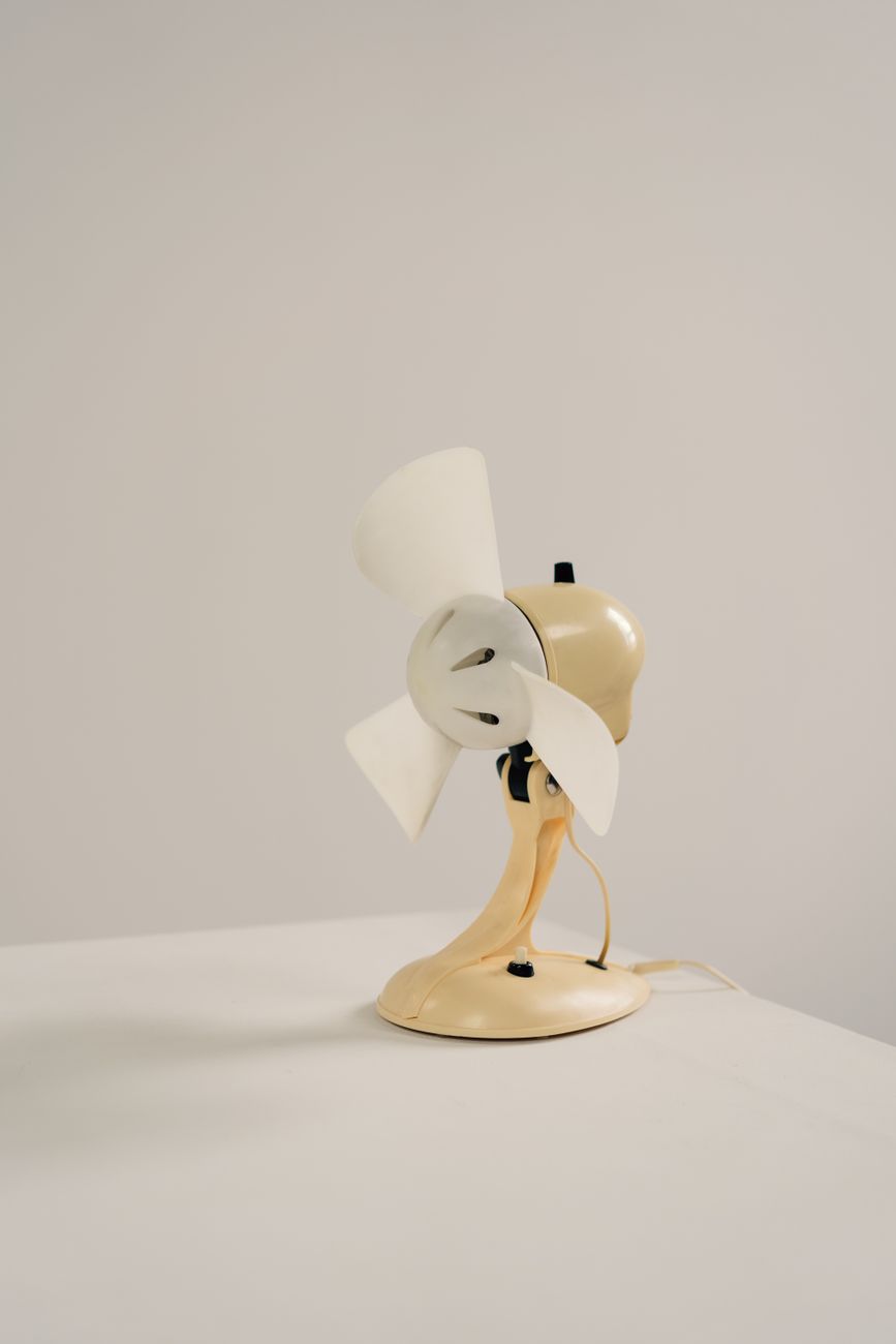 a desk fan on the table