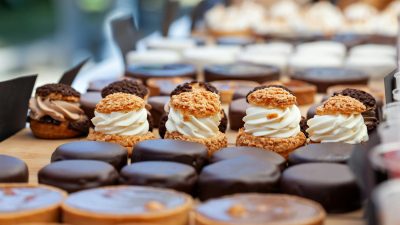 creamy cream puffs in tilt shift lens