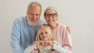 grandparents with their granddaughter