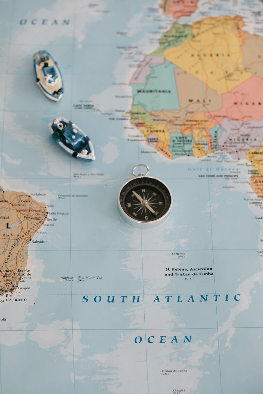 tiny ships near the metal pocket compass