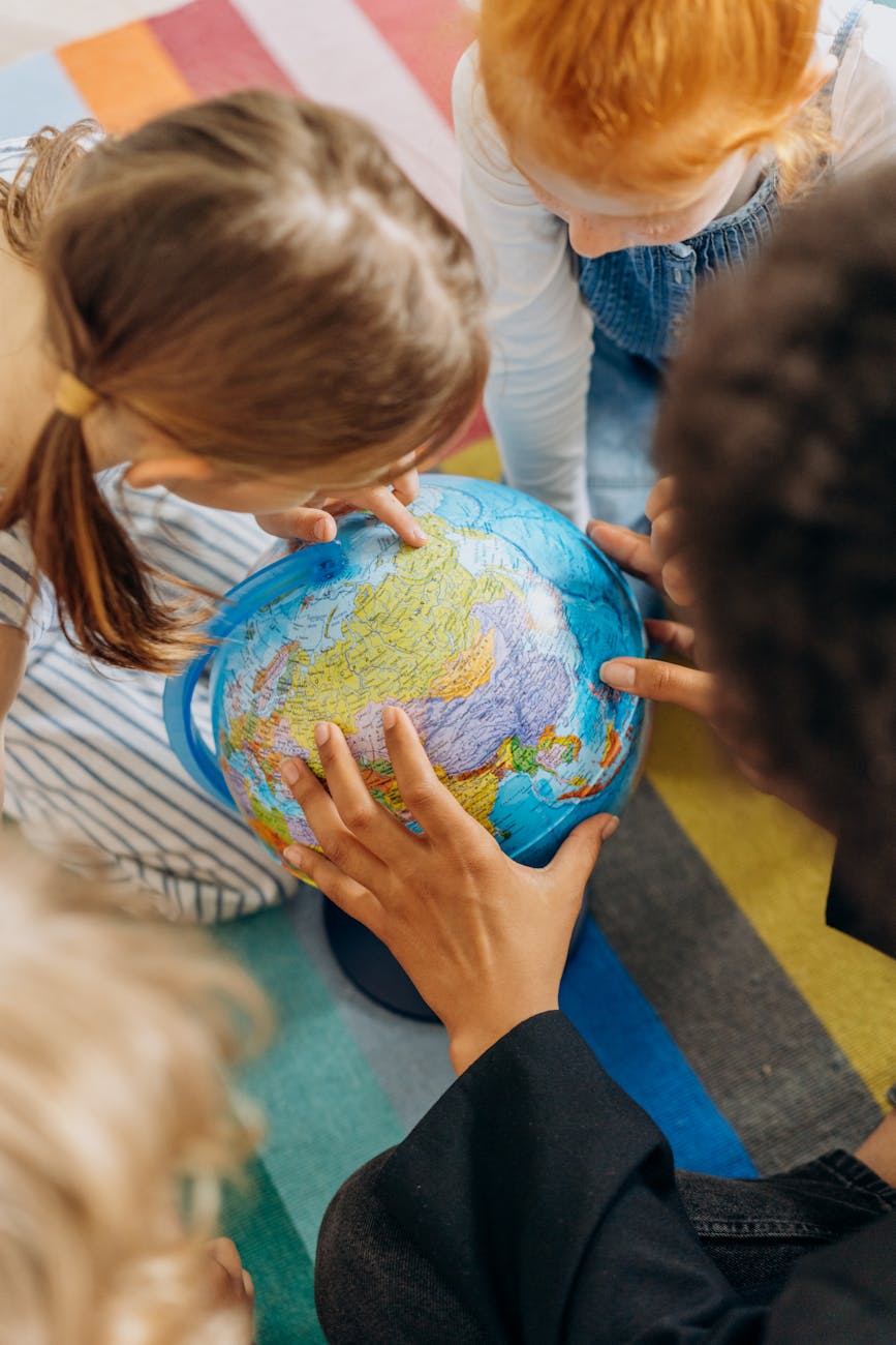 a children looking the globe