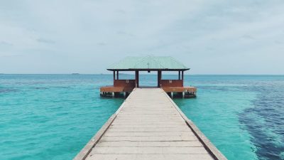 wooden jetty in a turquoise sea