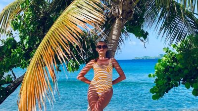 woman on coconut tree with green and yellow leaves