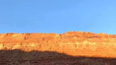 brown rock formation under blue sky