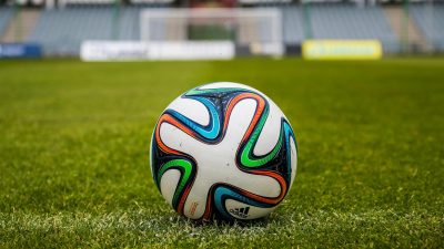 adidas soccer ball on grass open field